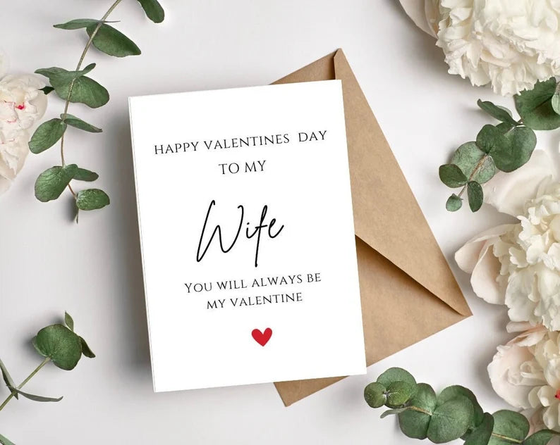 Valentine's Day card for wife with envelope and flowers on a white background