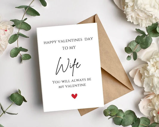 Valentine's Day card for wife with envelope and flowers on a white background